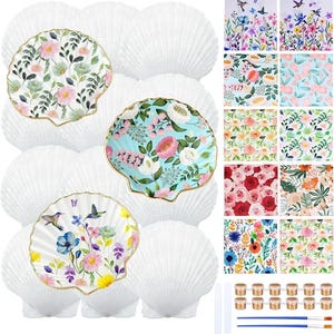 May include: A craft kit featuring scallop-shaped ceramic plates with floral designs and gold trim. The kit includes paint, brushes, and patterned paper squares. The plates have various floral patterns in pink, blue, and yellow.