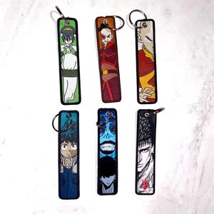 Llavero bordado de anime Jet Tag