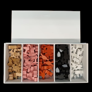 May include: A white plastic storage box with five compartments, each filled with small wooden animal figurines. The compartments contain pink, orange, black, and white figurines.