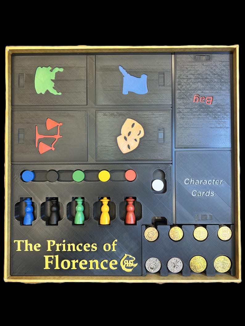 K&ouml;nnte beinhalten: Das Spieleinsatz f&uuml;r das Brettspiel Die F&uuml;rsten von Florenz mit F&auml;chern f&uuml;r Spielfiguren, Charakterkarten und M&uuml;nzen. Der Einsatz ist schwarz mit goldener Beschriftung und enth&auml;lt einen Beutel f&uuml;r Spielfiguren.