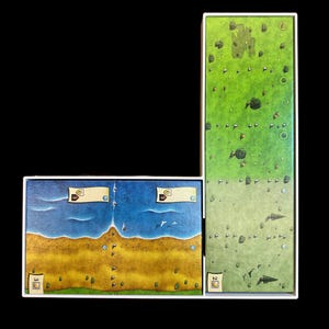 May include: A board game with three game boards. The boards are made of cardboard and have a white border. The top board is green and has a variety of images on it. The bottom two boards are blue and yellow and have a variety of images on them. The boards are numbered 2 and 3.