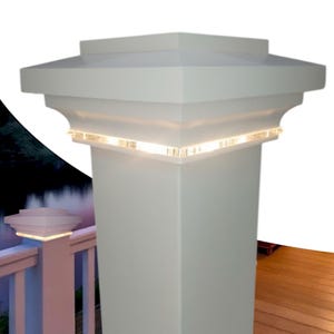 May include: White vinyl post cap with a built-in LED light strip. The light strip is on the top edge of the cap and illuminates the surrounding area.