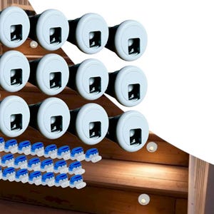 May include: A set of outdoor step lights with a white face and black body. The lights are round with a square opening and are mounted on wooden steps. Also included are blue and white wire connectors.