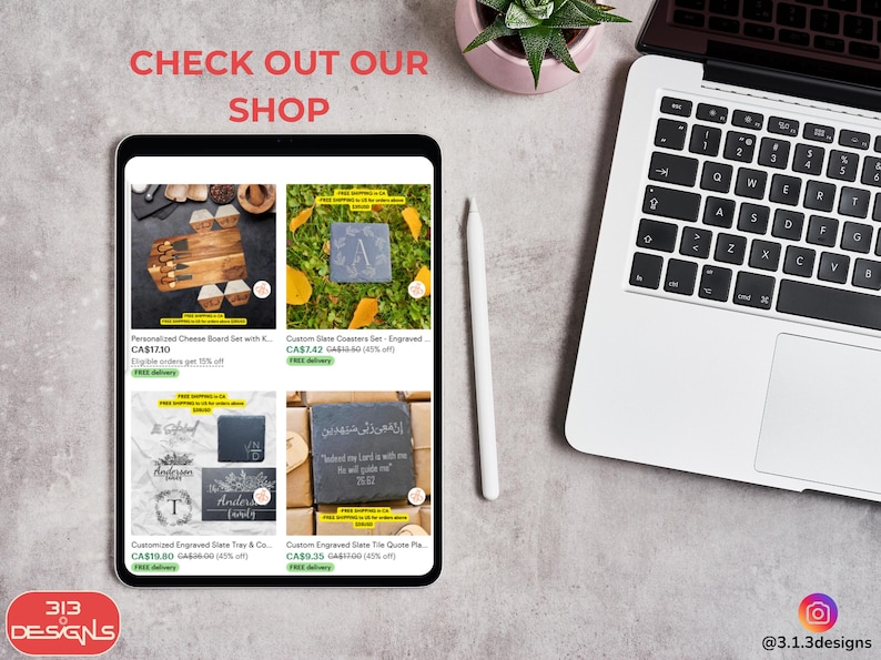 May include: A tablet displays Etsy listings for engraved slate coasters, cheese boards, and trays. A laptop, a white stylus, and a small potted plant are also visible. The text "CHECK OUT OUR SHOP" is at the top, and the shop's logo is at the bottom.