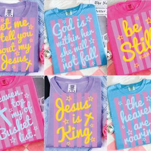 The image is a collage of six colorful t-shirts with various religious and inspirational messages printed on them.