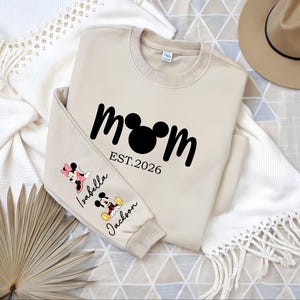 Comfort Colors® Personalized Disney Mickey and Friends Mama Sweatshirt, Disney Custom Mom,With Kids Name On Sleeve, Mother's Day Gift