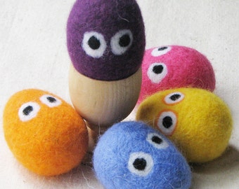 Easter eggs with googly eyes - felted from colorful wool for Easter decorating and gift giving