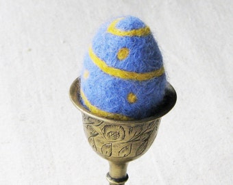 Easter egg, needle felted from wool in soft cornflower blue with sunny yellow stripes and dots