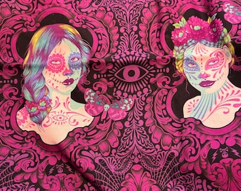 May include: A fabric print featuring a repeating pattern of two distinct figures with sugar skull face paint, surrounded by ornate magenta and black damask-style scrollwork, moths, and eye motifs. The design incorporates vibrant pink, purple, and teal colors.