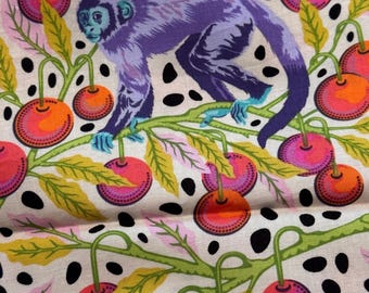 May include: A fabric print featuring a purple monkey perched on a green branch surrounded by bright pink and orange cherries. The background is off-white with scattered black oval spots, green leaves, and pink foliage accents throughout.