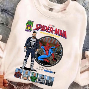 May include: A white ceramic mug with a black handle and the text "But First, Coffee" in a bold, black font. The mug is set against a blurred background, suggesting a cozy setting.