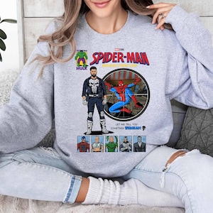 May include: A white ceramic mug with a black handle and the text "But First, Coffee" in a bold, black font. The mug is set against a blurred background, suggesting a cozy setting. The mug appears to be approximately 4 inches tall.