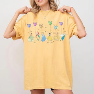 May include: A set of three ceramic mugs with a speckled, matte finish. The mugs are in shades of cream, light gray, and dark gray. Each mug has a simple, minimalist design, perfect for coffee or tea.