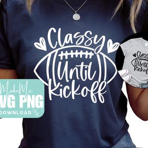 May include: Navy blue t-shirt with the text "Classy Until Kickoff" in white, featuring a football graphic. A smaller image of the same design on a gray shirt is visible. The shirt is a casual style.