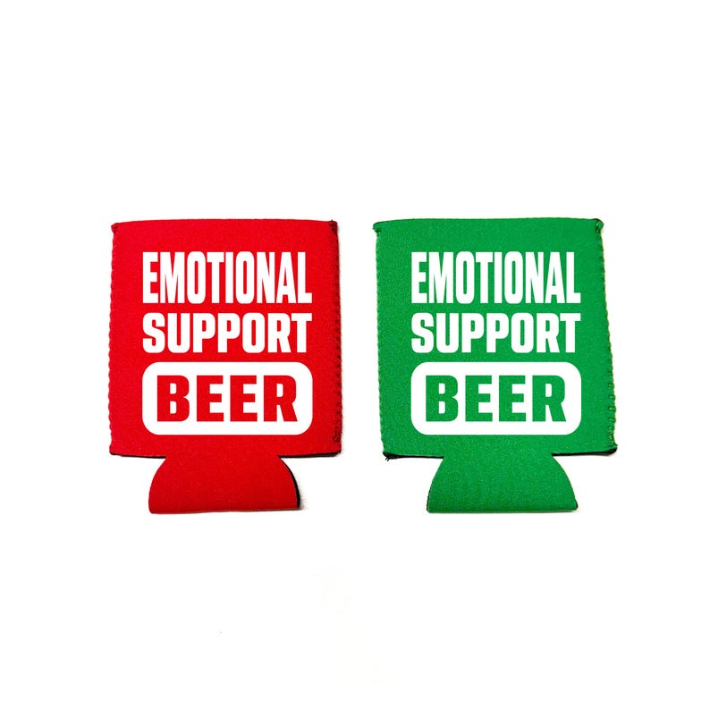 May include: Two foam beverage insulators, one red and one green, with the text "Emotional Support Beer" in white.
