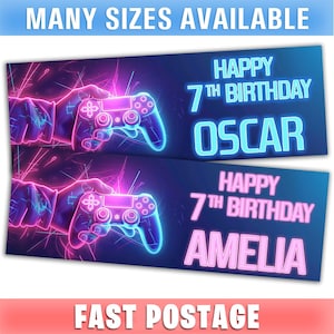 May include: Two banners with a neon-style design. Each banner features a hand holding a video game controller, with the text "Happy 7th Birthday" and a name. The top banner says "Oscar", and the bottom banner says "Amelia". The top banner also says "Many Sizes Available".