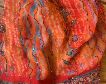 4. Recycled silk, remnant sari piece, beaded silk fabric, orange, red, purple, metallic thread embroidery.