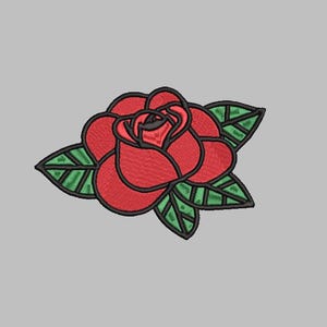 May include: A red rose with green leaves, outlined in black, is embroidered on a white background.