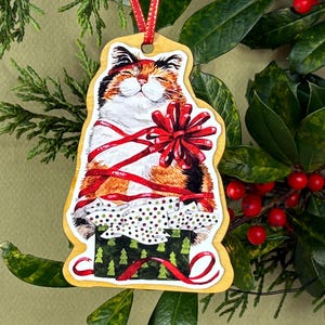 Cat in a Box, Christmas Kitten Ornament, Calico Kitty Gift Box wrapped with a Red Bow