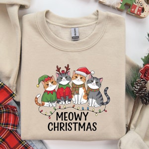 Cat Christmas Sweatshirt, Meowy Christmas Shirt,Cat Lover Christmas Shirt,Christmas Cat Mom Sweater,Catmas Gift for New Year,Holiday Sweater