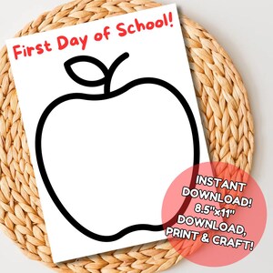 May include: A white printable sheet with a large black apple outline and the text "First Day of School!" in red. A pink circle with text reads "INSTANT DOWNLOAD! 8.5"x11" DOWNLOAD, PRINT & CRAFT!"