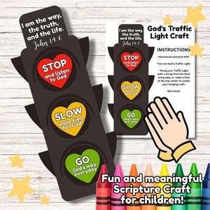 May include: A black traffic light craft with red, yellow, and green heart-shaped lights. Text on the craft includes "STOP and listen to God," "SLOW make time for God," and "GO God's way everyday." The image also includes crayons and text that reads "Fun and meaningful Scripture Craft for children!"