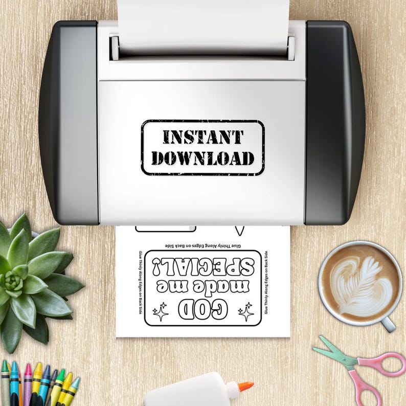 May include: A white printer with black side panels features the text INSTANT DOWNLOAD. A printed paper sheet below displays the text GOD made me SPECIAL! with star icons, alongside a green succulent, a coffee cup, and colorful crayons.