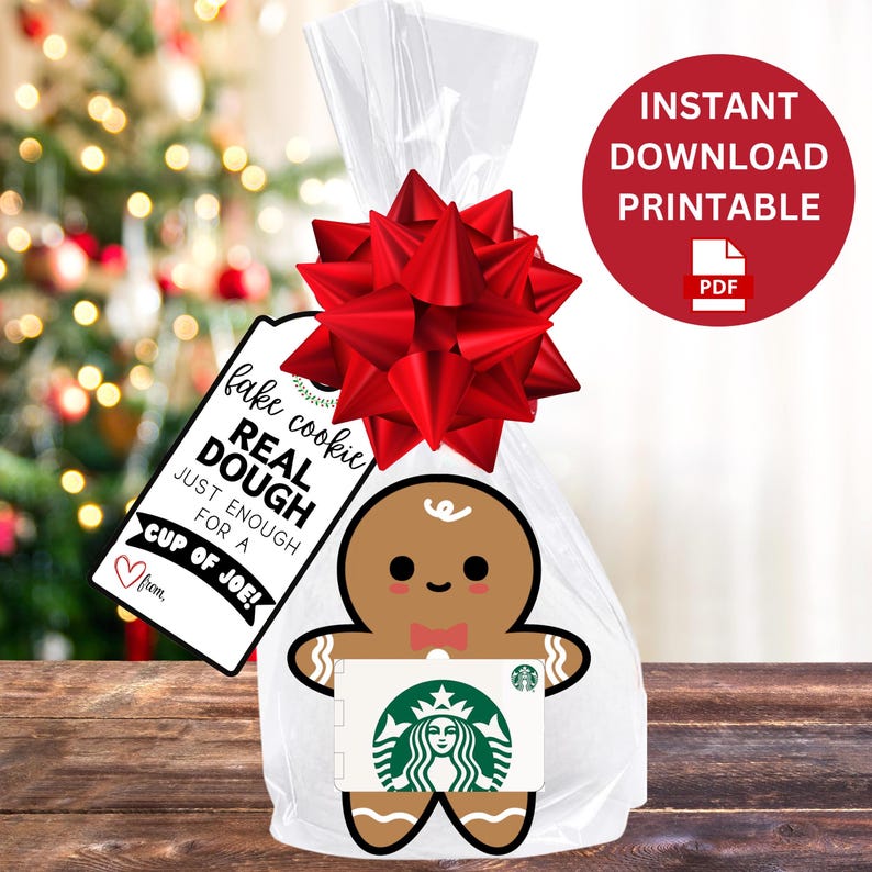 May include: A printable gift tag with a gingerbread man illustration and the text "fake cookie REAL DOUGH JUST ENOUGH FOR A CUP OF JOE!"  The tag is tied to a clear cellophane bag with a red bow.