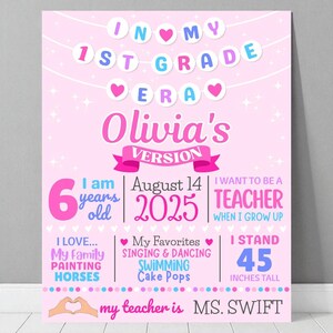 May include: A pink 1st Grade Era poster with the name "Olivia's" in large pink letters. The poster includes the text "I am 6 years old", "August 14 2025", and "I want to be a teacher". It also lists favorite things and teacher's name.