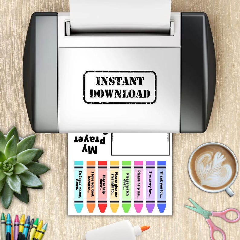 May include: A printer is shown with a printed sheet that says "My Prayer" and "Instant Download". The sheet has colorful crayon-like bars with phrases like "Thank you for..." and "In Jesus' name, Amen.". Other items include a succulent, coffee, scissors, glue, and crayons.