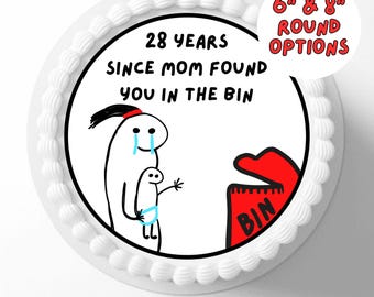 May include: Printable cake image with a white background and a round, white cake with a red, white, and blue design. The design features a cartoon drawing of a person holding a baby with the text "28 Years Since Mom Found You In The Bin". The cake is available in 6-inch and 8-inch round options.
