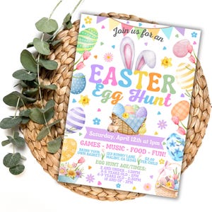 May include: An invitation to an Easter Egg Hunt with a colorful watercolor design featuring bunnies, eggs, and flowers. The invitation includes the date, time, location, and age groups for the egg hunt.
