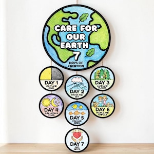May include: A decorative wall hanging with a circular Earth design and the text "Care for Our Earth." Seven smaller circles depict the days of creation, including land, plants, and animals. Ideal for a child's bedroom, it's a colourful, handmade item.