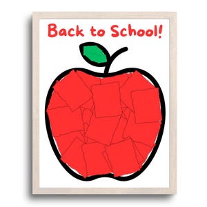 May include: A framed artwork featuring a large red apple shape with a black outline, filled with red squares. The apple has a green leaf and stem. The words "Back to School!" are written in red at the top. The frame is light-colored.
