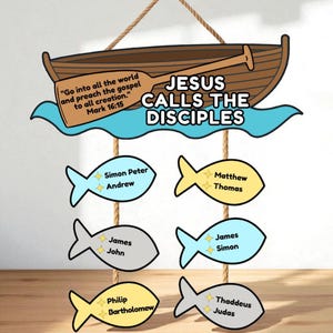 May include: A wooden wall hanging featuring a brown boat with an oar, blue water, and six fish. The text "JESUS CALLS THE DISCIPLES" is displayed. Each fish has a name: Simon Peter, Andrew, Matthew, Thomas, James, John, James, Simon, Philip, Bartholomew, Thaddeus, and Judas.