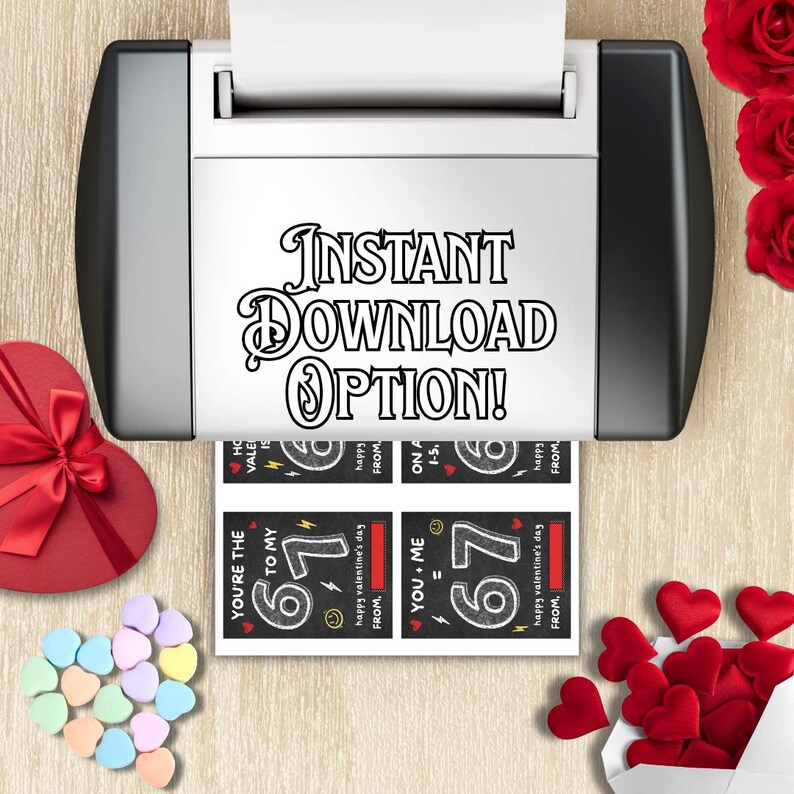 May include: A printer printing Valentine's Day cards with the text "Instant Download Option!". The cards feature the numbers "67" and phrases like "You're the 67 to my..." and "You + Me = 67". A heart-shaped box, candy hearts, and roses are also visible.