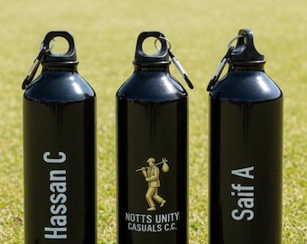May include: Three black water bottles with silver carabiner clips. One bottle has the name "Hassan C" in white, another has a logo and text "NOTTS UNITY CASUALS C.C.", and the third has "Saif A".