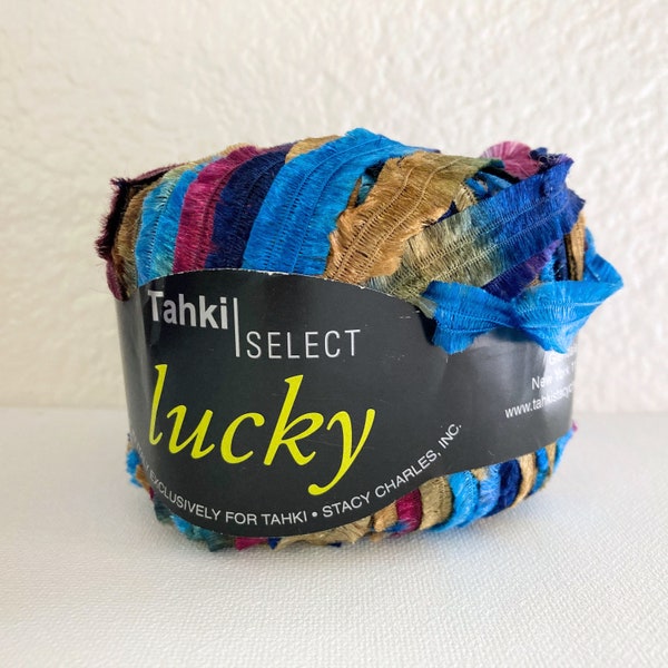tahki lucky ribbon yarn . renaissance 4 . italian ribbon yarn . 54yds . wide feather fringe ribbon . blue gold burgundy navy