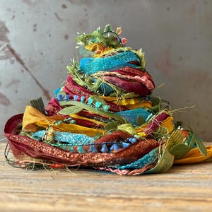 dancing leaves fringe effects™ fiber bundle 24yds art yarns ribbons trims textiles . burnt orange copper gold turquoise olive berry green
