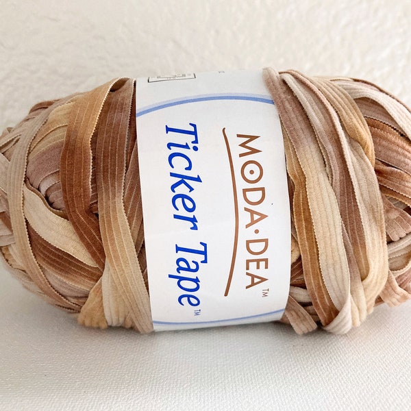 moda dea ticker tape yarn . suede 9256 . 67yds . sand tan beige ribbon . bulky yarn . vintage stock yarn