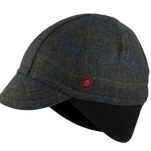 Gregario Winter Cap handmade with short brim by Red Dots Cycling. 100% Italian wool cashmere fabric. Colors: grey, blue & camel. Black ear flap is double-layered, bamboo cotton ribbed. Red Dots burgundy logo embroidered on side panel.
