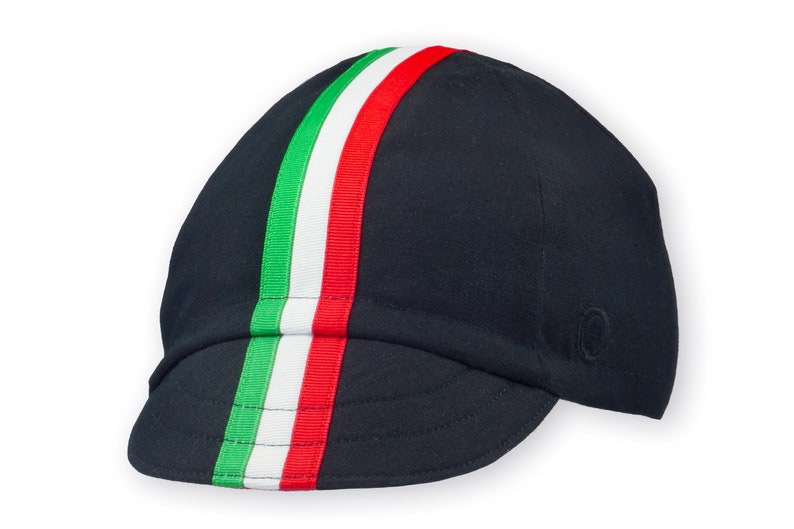 Tifosi Cycling Cap
A four-panel, Black linen/cotton hat with a short brim. Green, white and red ribbon runs from the back of the hat to the bottom of the brim. Red Dots embroidered black logo on the side panel.