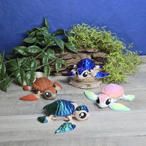 Juguete sensorial articulado de escritorio con imán de tortuga marina impreso en 3D. Elige el tuyo.