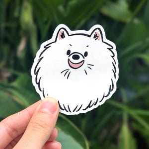Sticker Pommeren | Schattige pluizige witte spitzhond | Grote vinylstickers cartoon hoofd