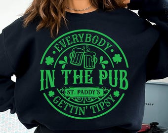 May include: Black sweatshirt with a green circle graphic that says "Everybody in the Pub Gettin' Tipsy" with a shamrock and two beer mugs.