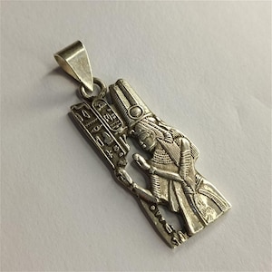 Ancient Egyptian silver 800 pendant featuring pharaoh with hieroglyphic details