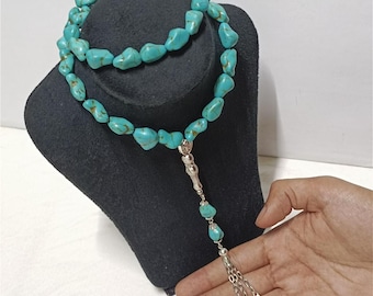 Tasbih industrial de turquesa hecho a mano con 33 cuentas y detalles en plata: un regalo elegante.