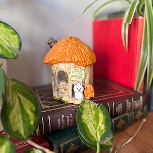 Vintage Enesco Coin / Piggy Bank &quot;God Bless our Mortgaged Home&quot; with Bunny and Tree Stump House, Made from Bisque Porcelain & Hand Painted