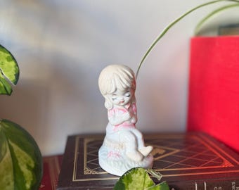 Vintage Porcelain Girl Figurine: Hand-Painted Pink Pigtails