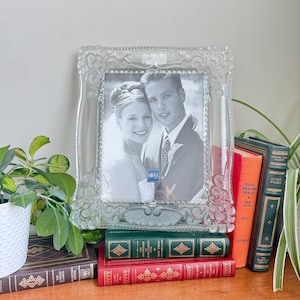 May include: A set of three ceramic mugs with a speckled, matte finish. The mugs are in shades of cream, light gray, and dark gray. Each mug has a simple, minimalist design, perfect for coffee or tea.